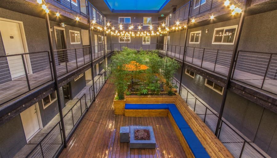 arium with a pool and a courtyard with lights