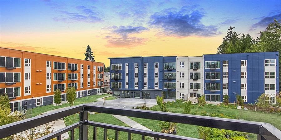 a view of an apartment building from a balcony