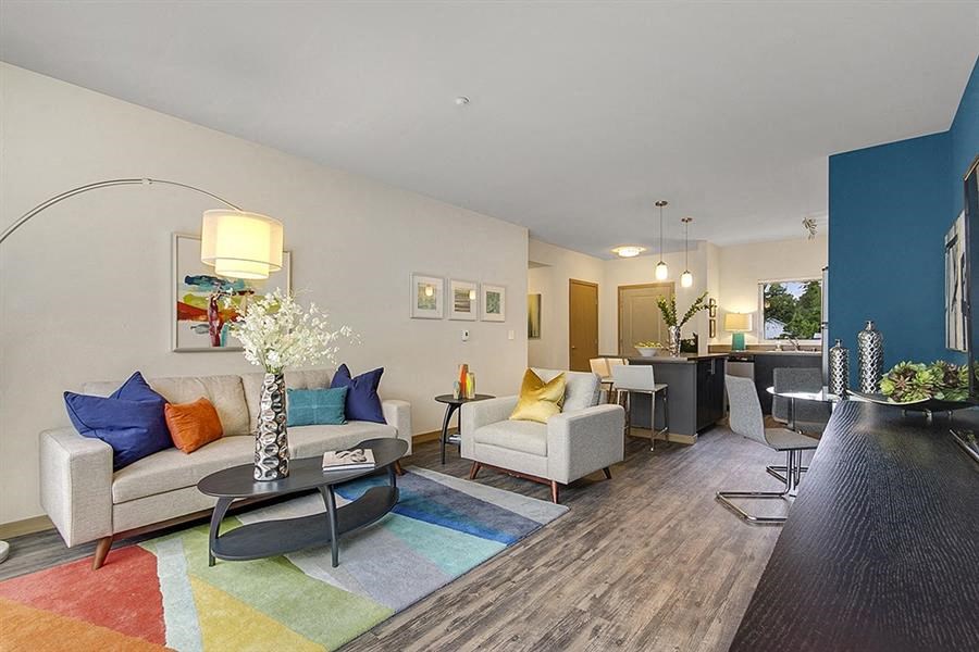 a living room with a couch and a table