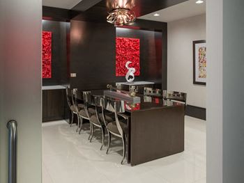 a room with a table and chairs