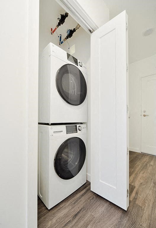a white washer and dryer in a room