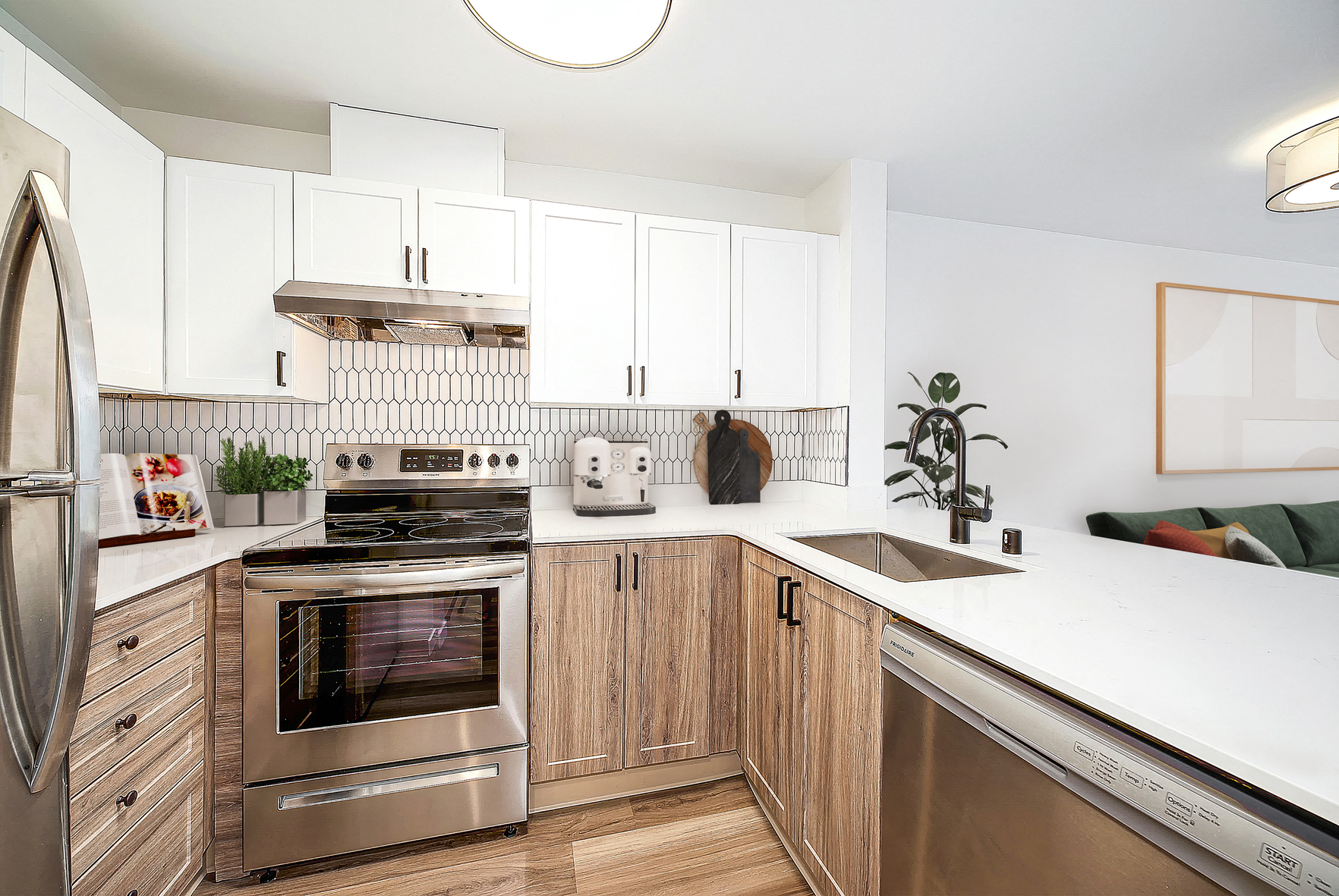 a modern kitchen with white cabinets and stainless steel appliances