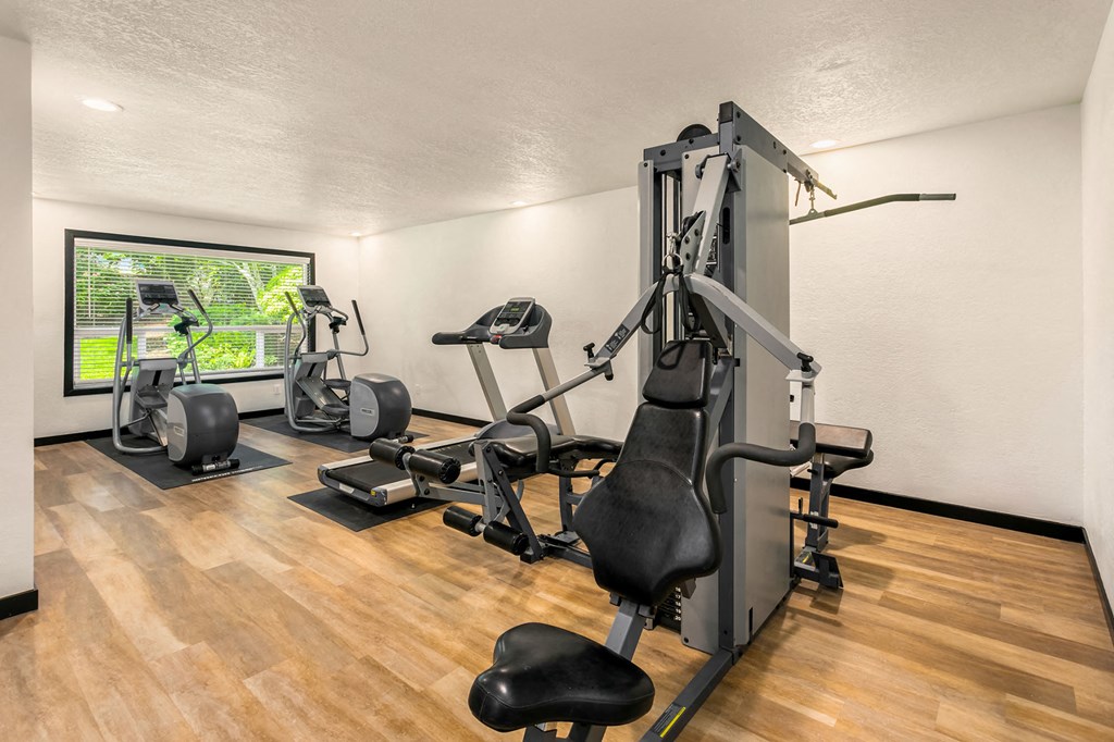 the gym is equipped with state of the art equipment including cardio machines and weights