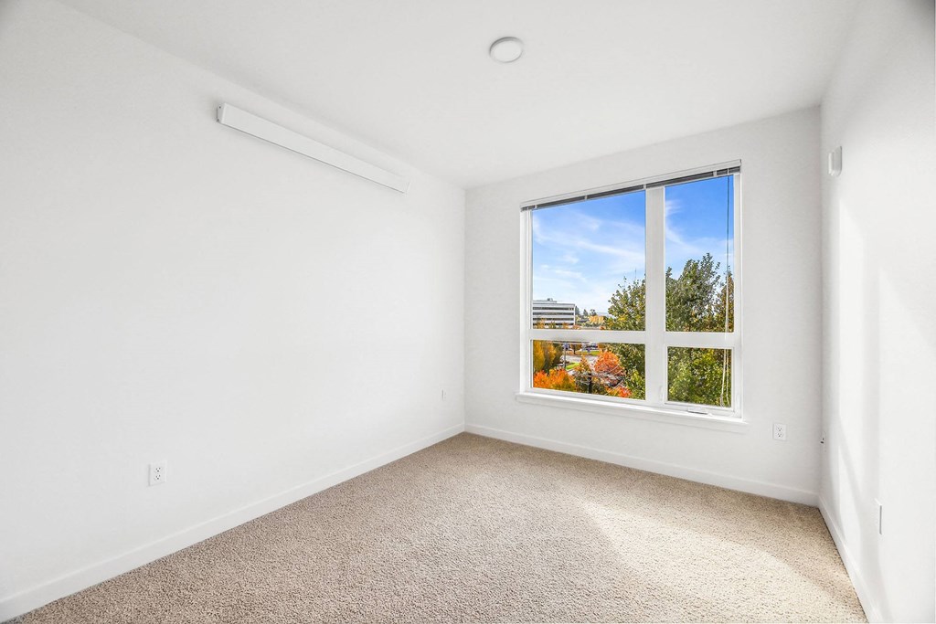 an empty room with a window in it