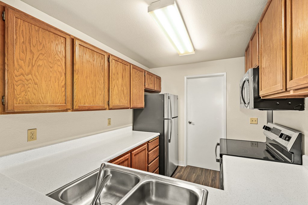 the preserve at ballantyne commons apartment kitchen with stainless steel appliances