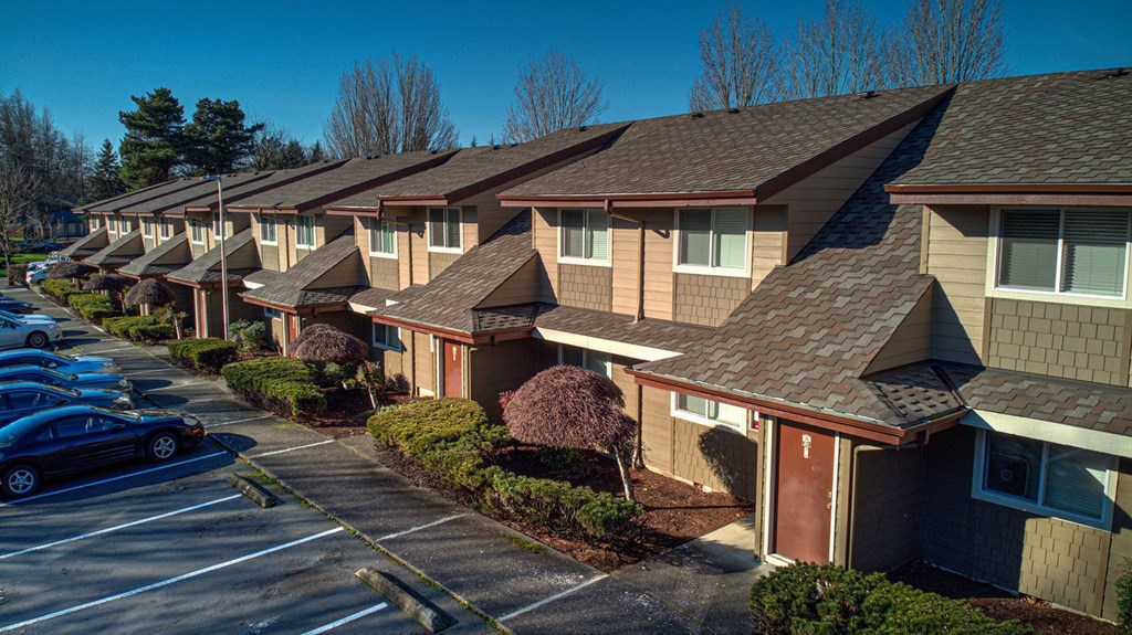 a row of houses in a parking lot