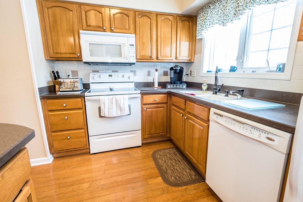 Pine Grove Estates – Kitchen - Dining – Appliances – Breakfast Bar - 24 Hour Emergency Maintenance – Dishwasher - Storage - 55+ Community - Ask for a Tour - Pet Friendly