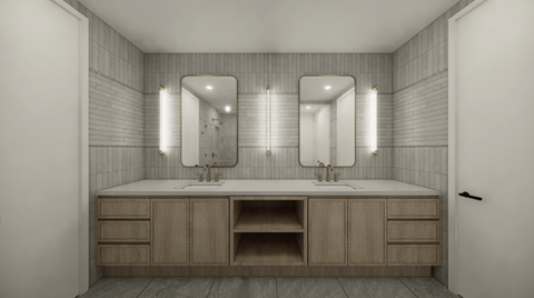 A bathroom with a vanity and two mirrors.