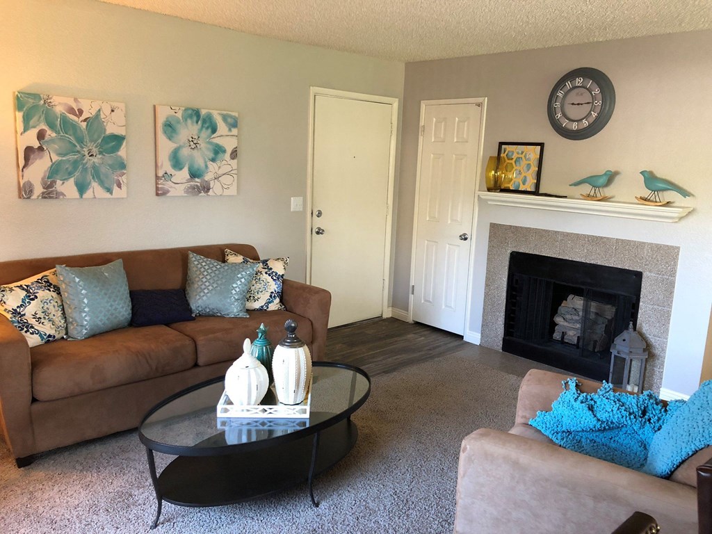 a living room with couches and a coffee table