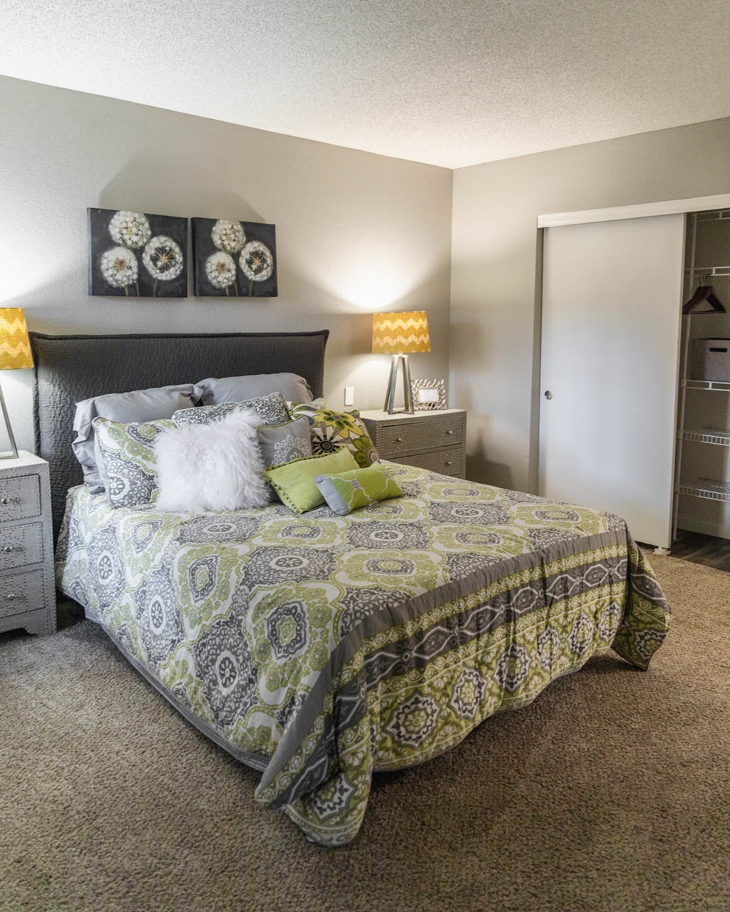 a bedroom with a bed and a closet
