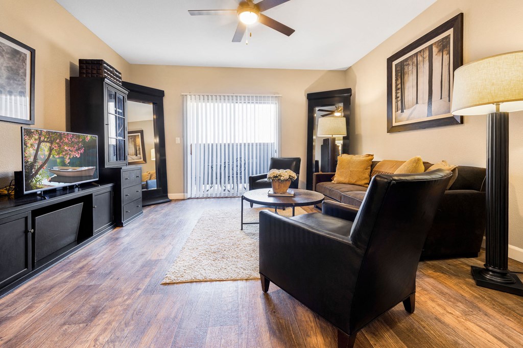 a living room with a couch and a tv
