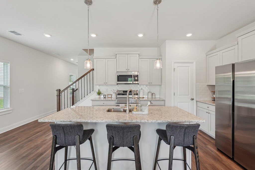 Sophisticated living space showcasing an open flow between the living and dining areas.