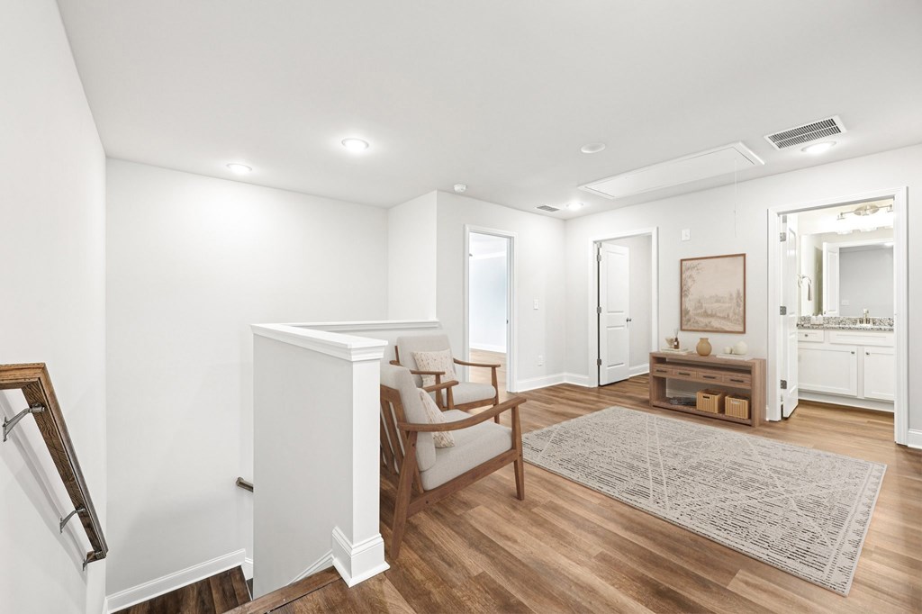 Loft area ideal for family gatherings just steps from the upstairs bedrooms.