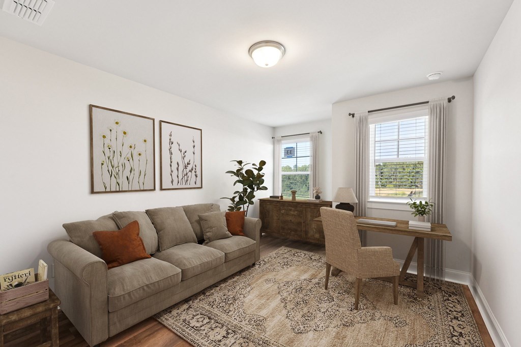 View of the living room area featuring an open concept.