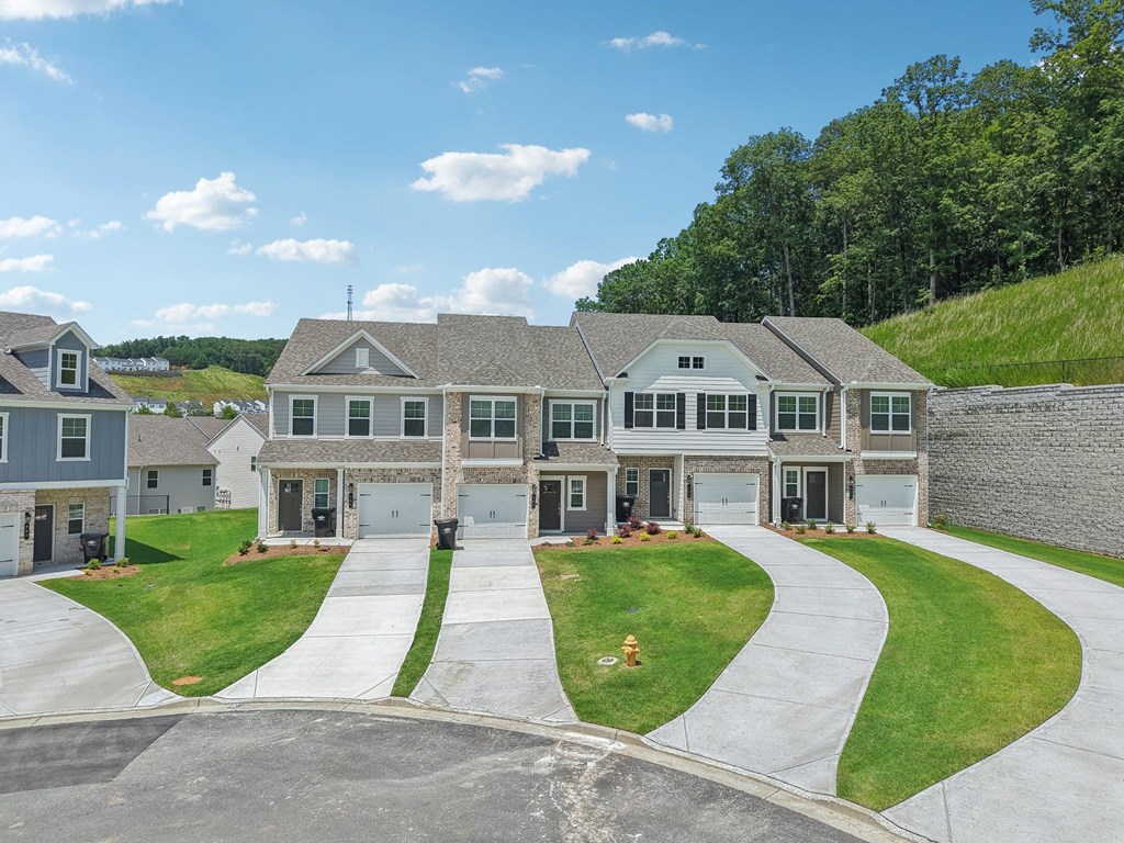 Scenic view of the community entrance welcoming residents to the homes.