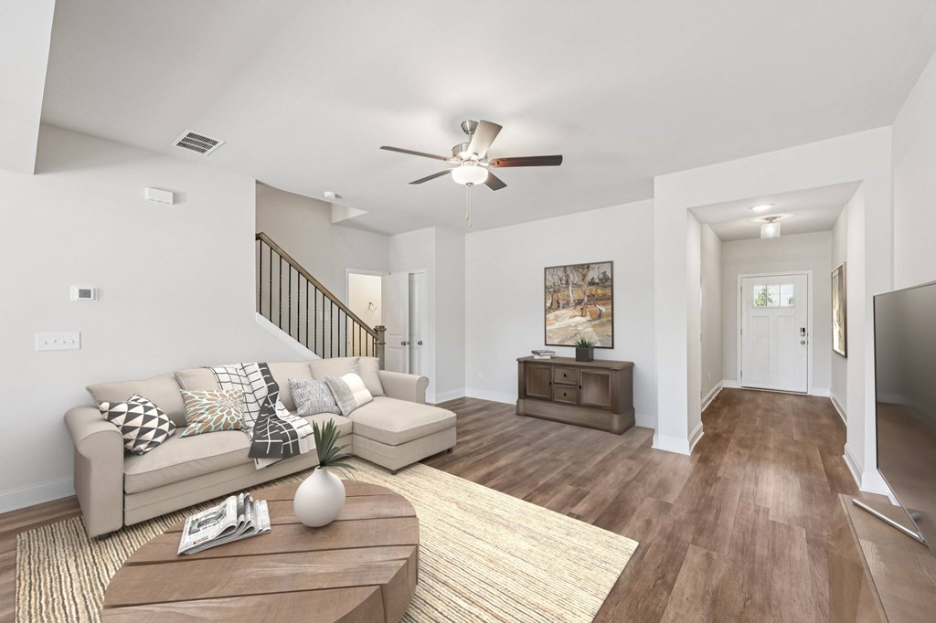 A refined living area offering a graceful view of the home’s entryway.