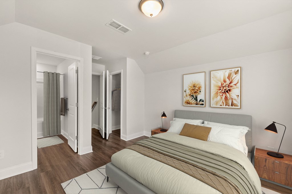 Sun-drenched secondary bedroom with a queen bed.