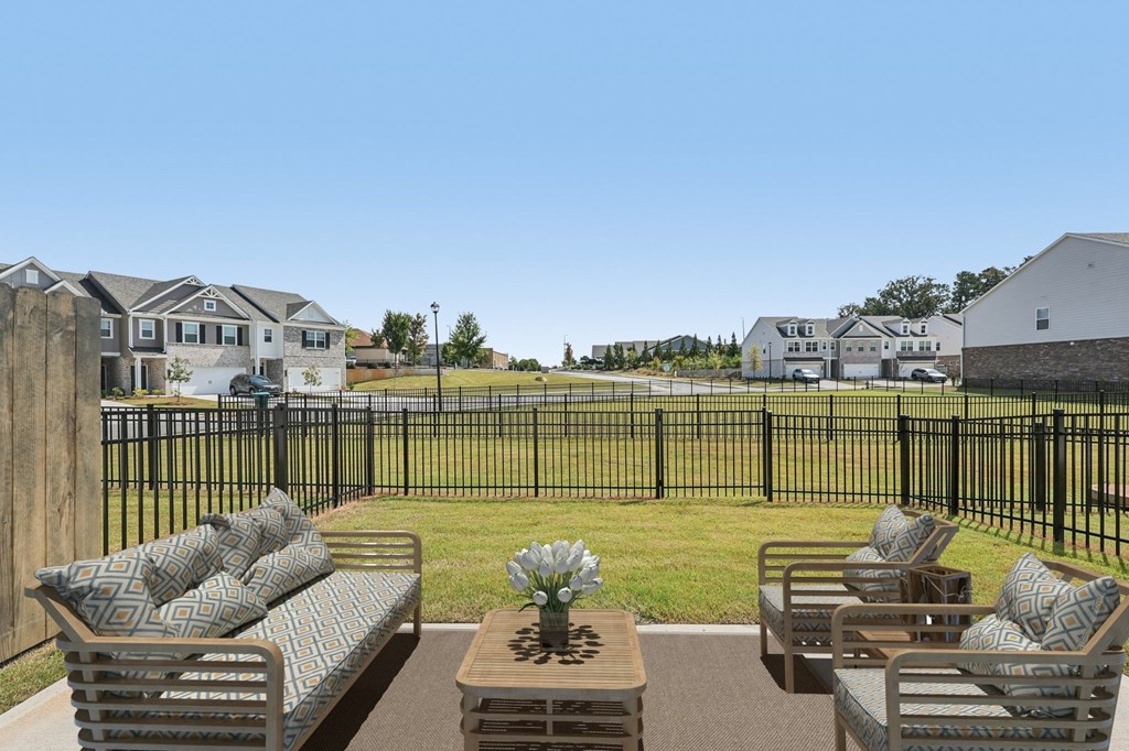 A private fenced patio offering an elegant outdoor retreat.