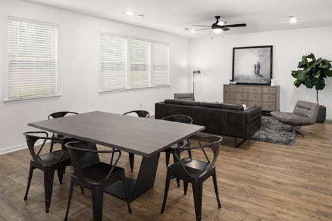 Living room with open view to kitchen.