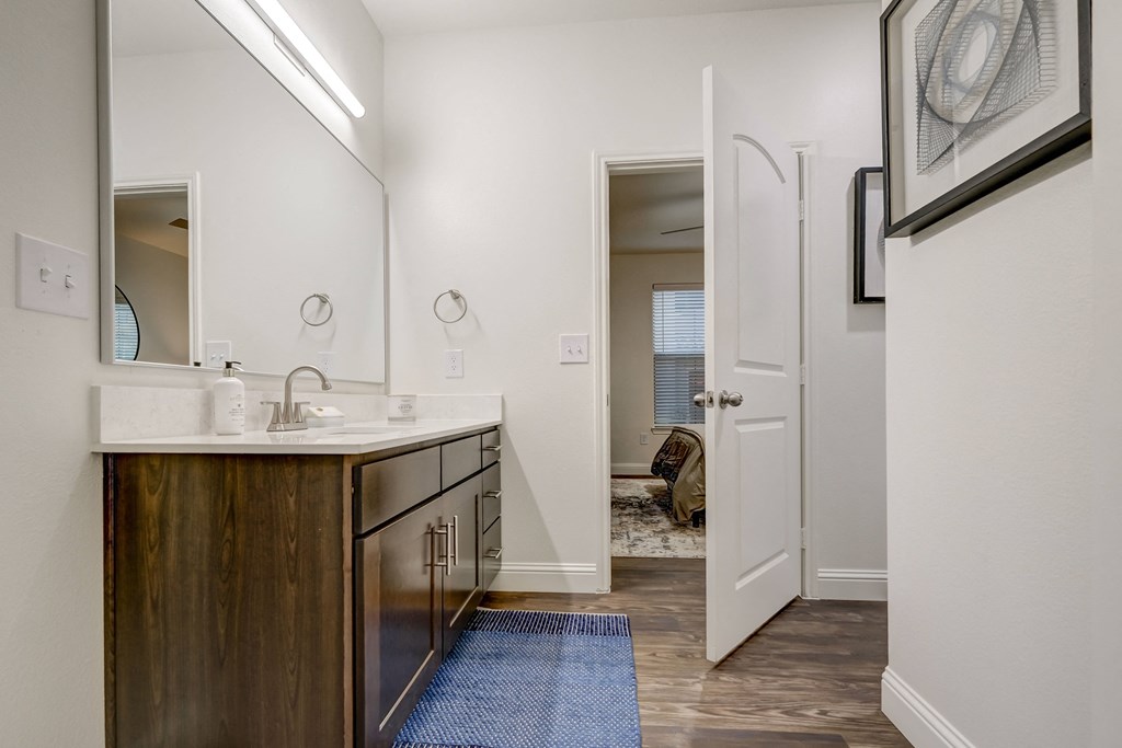 Spacious bathroom with vanity mirror