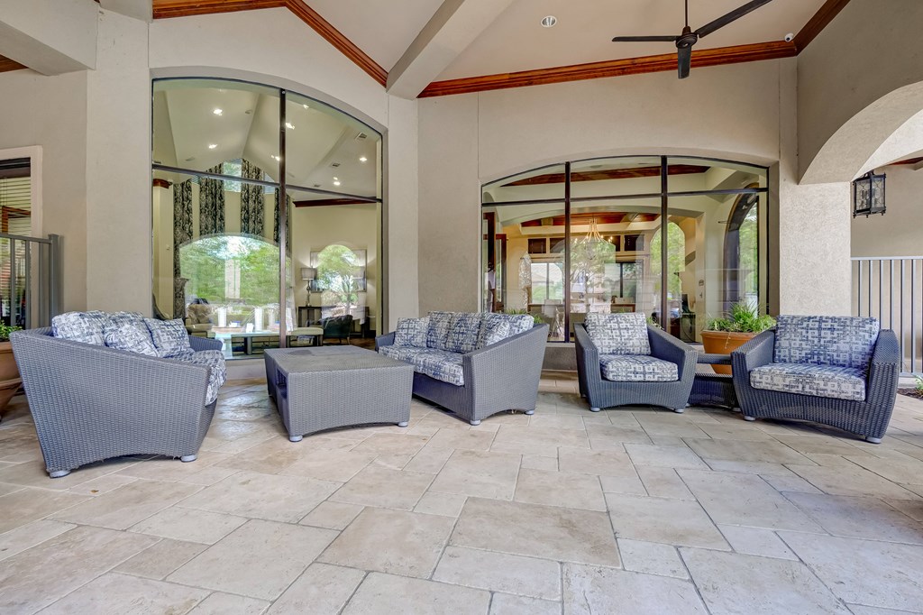 Outdoor lounge area with poolside seating
