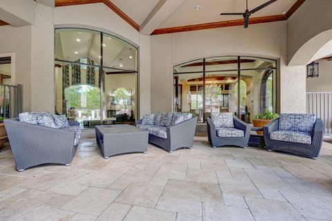 Outdoor lounge area with poolside seating