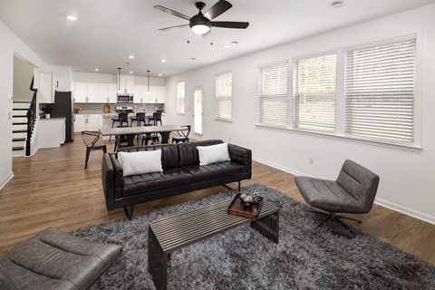 a living room with a couch and a table