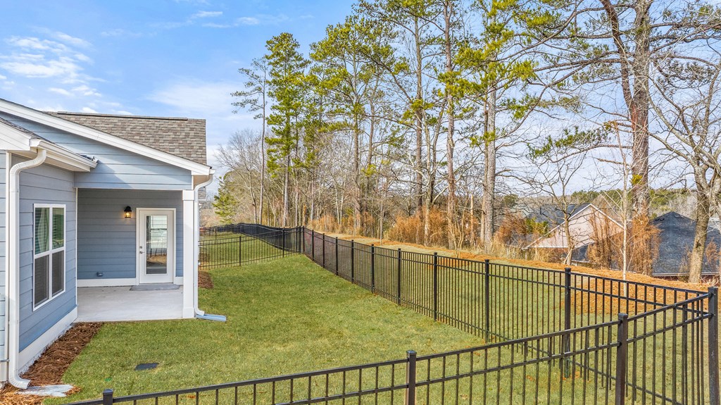 Private fenced backyard retreat.