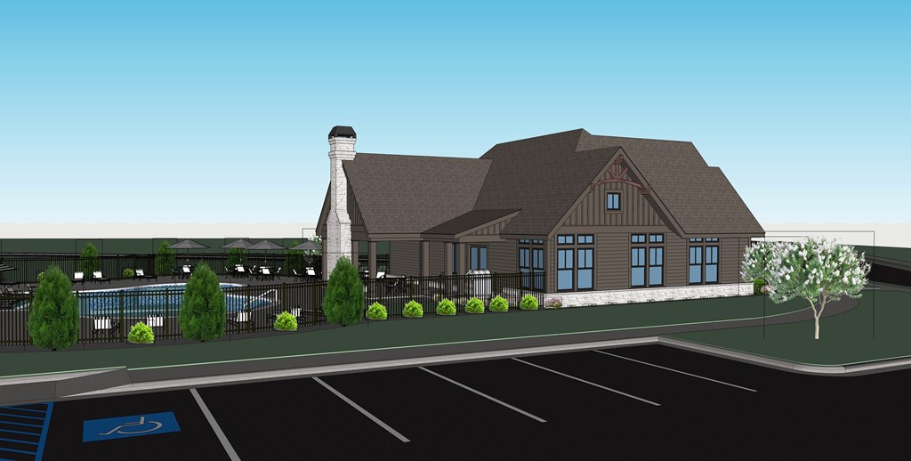 Clubhouse exterior with ample parking for residents and visitors.