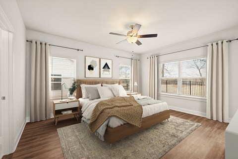 Serene primary suite with a plush king bed, refined finishes, and calming greenery—your private retreat for rest and relaxation.