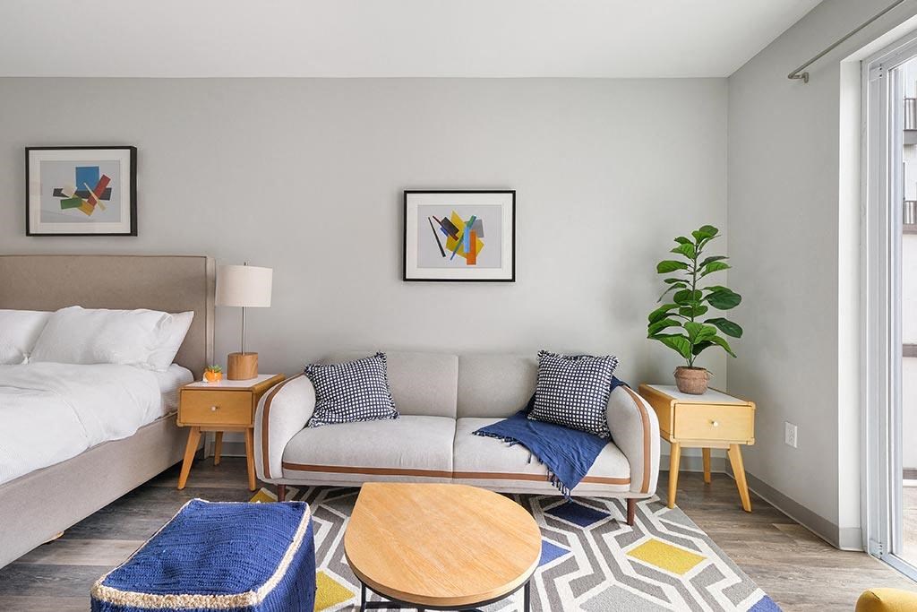 a living room with a couch and a table