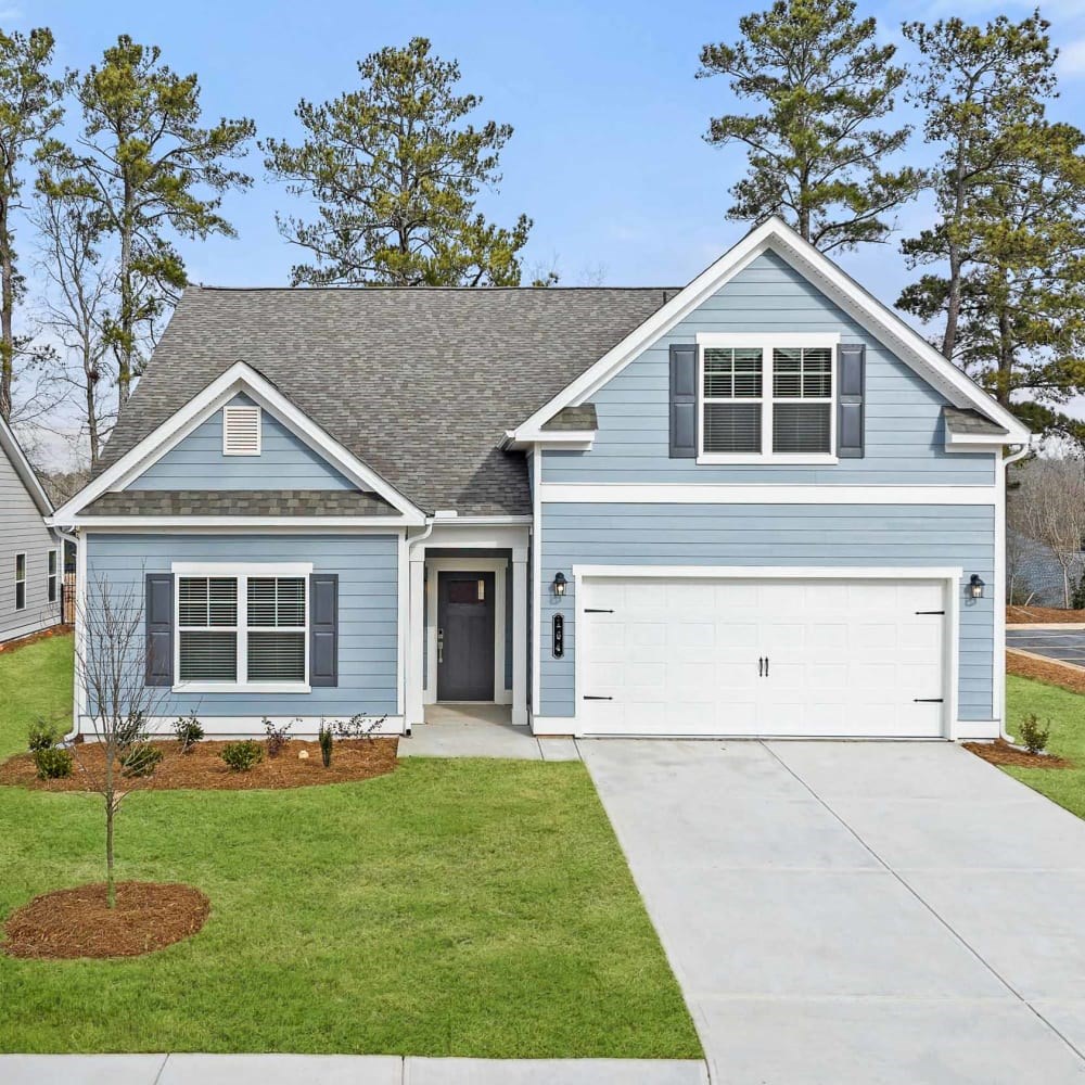 Stylish exterior of the two-story Wakefield with a private driveway and attached garage.