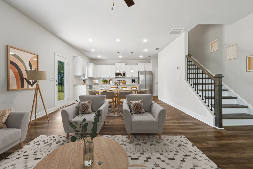 Elegant view of the living room and staircase.
