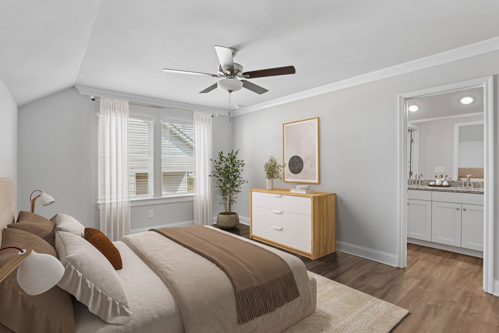Secondary view of the bedroom with entry to the primary bathroom