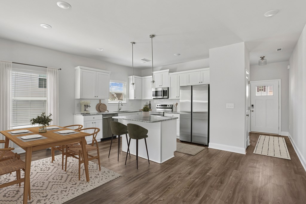 Alternate view of the kitchen and hallway entryway.