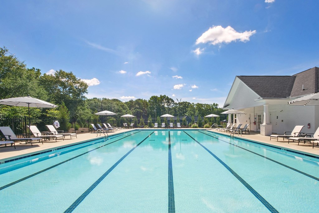 Resort-inspired pool area with stylish lounge seating.