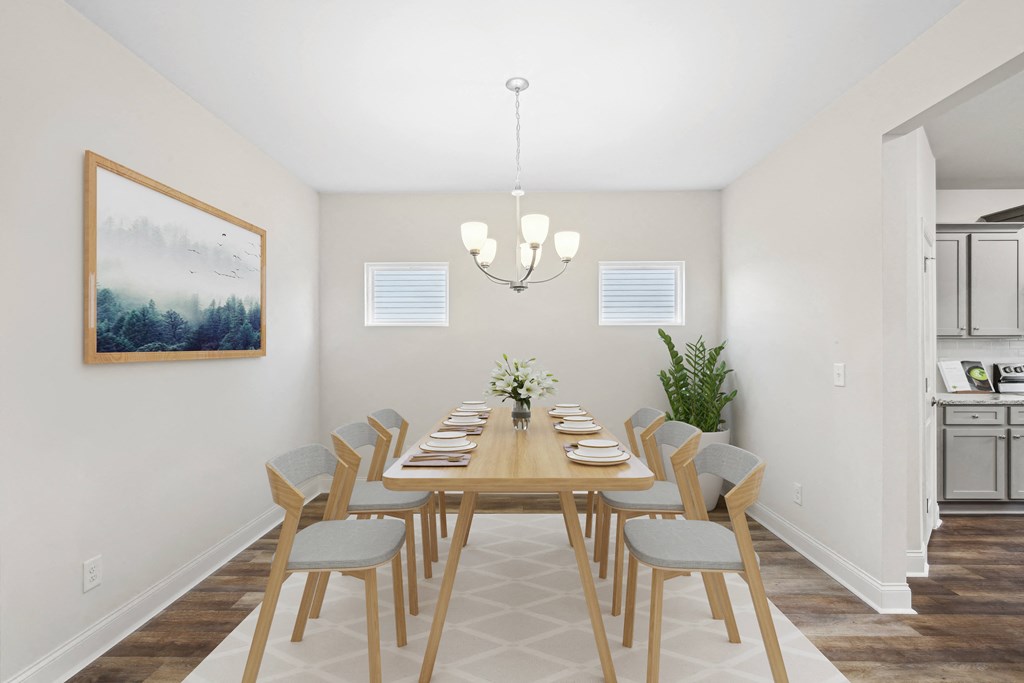 Elegant dining room featuring a rich wooden table and timeless seating—designed for unforgettable family gatherings.
