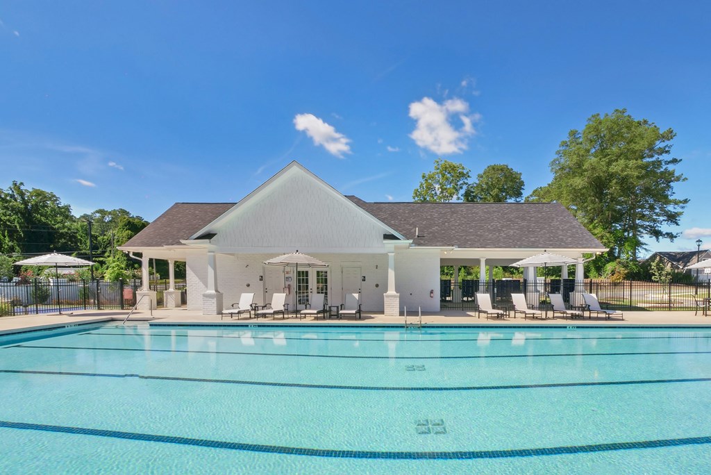 Luxurious poolside retreat with elegant seating.