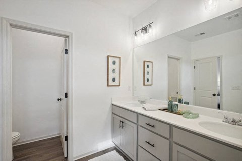 Separate toilet area for added privacy and convenience.