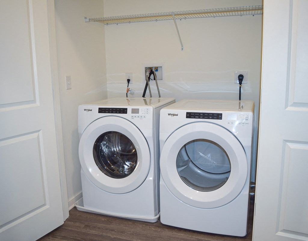 a washer and dryer in a home laundry room