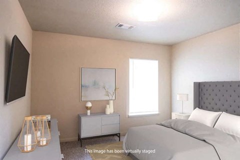 Bedroom with lots of natural lighting