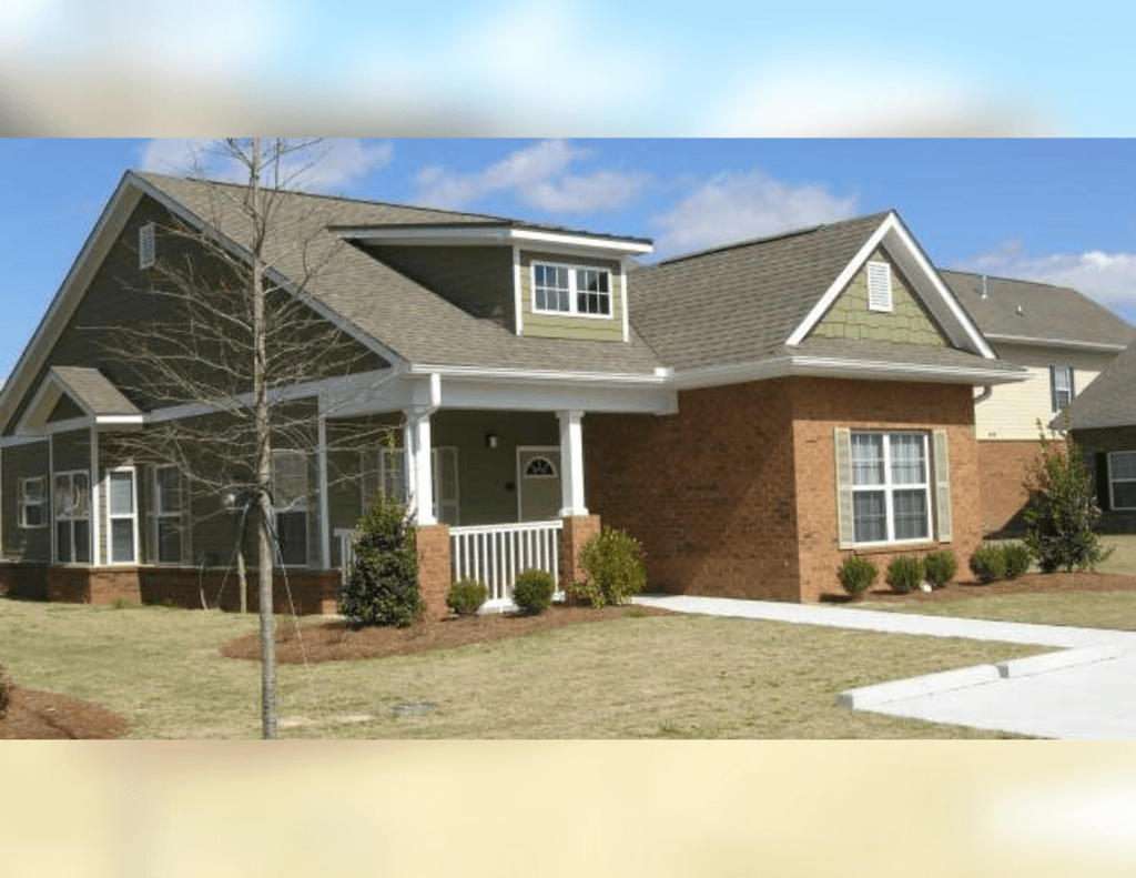 a house with a yard and a porch