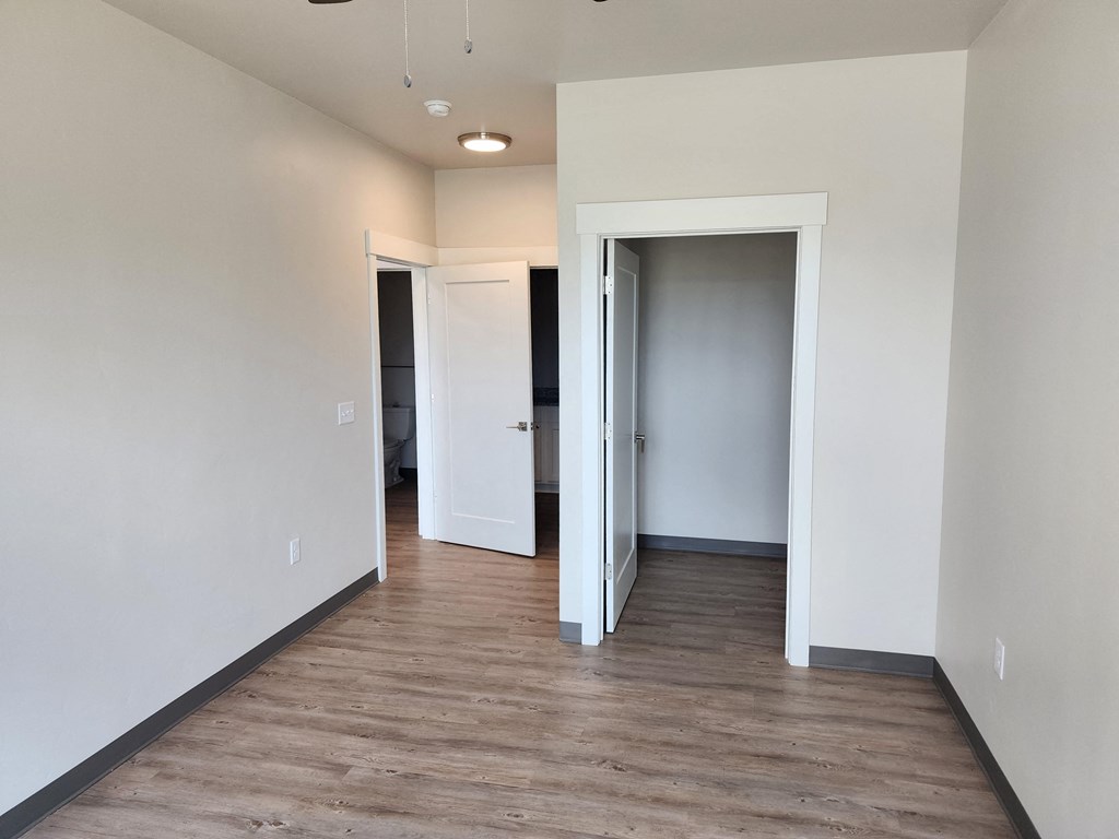 a bedroom in a 555 waverly unit