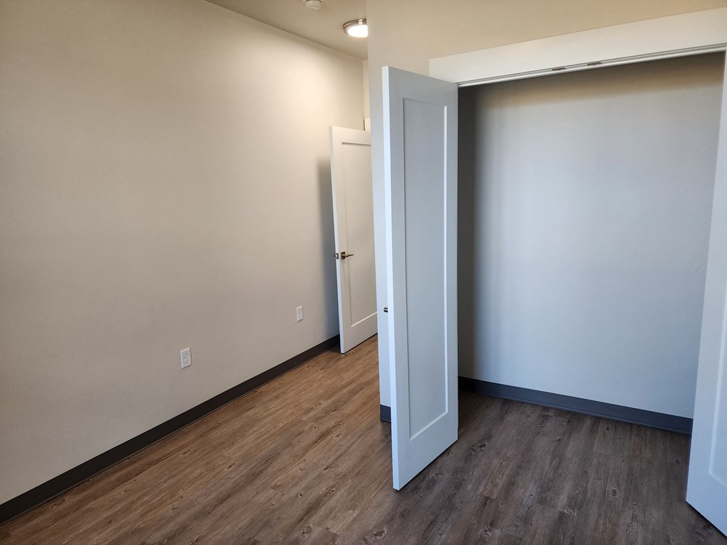 a bedroom in a commodore commons commons apartment