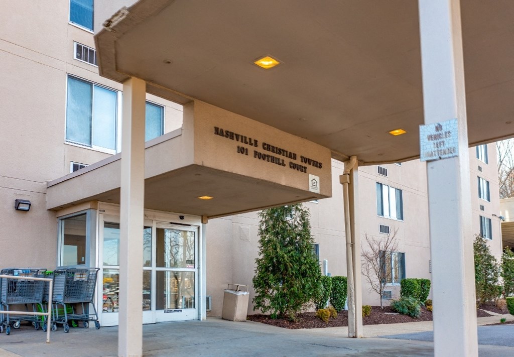 an entrance to a building with a sign on it that says lutheran church of the