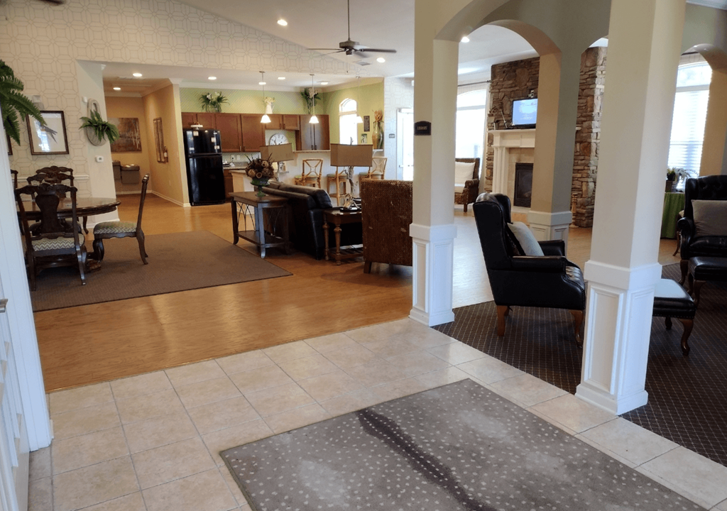 a view of the living room and dining room from the foyer