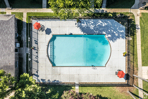 arial view of a swimming pool in a backyard