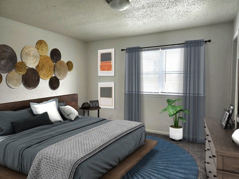 a bedroom with a bed and a blue rug