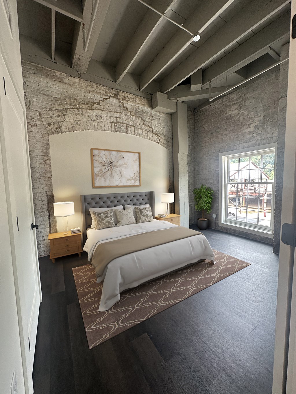 a bedroom with a bed and a window at The Mill at Prattville, Prattville, AL