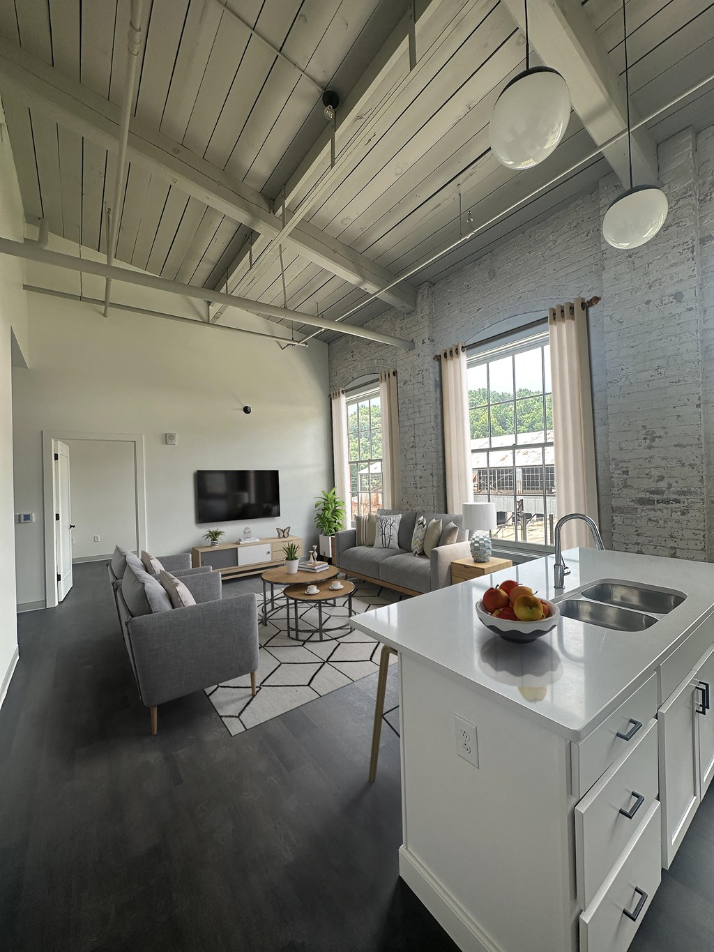 a view of the living room from the kitchen at The Mill at Prattville, Prattville, AL